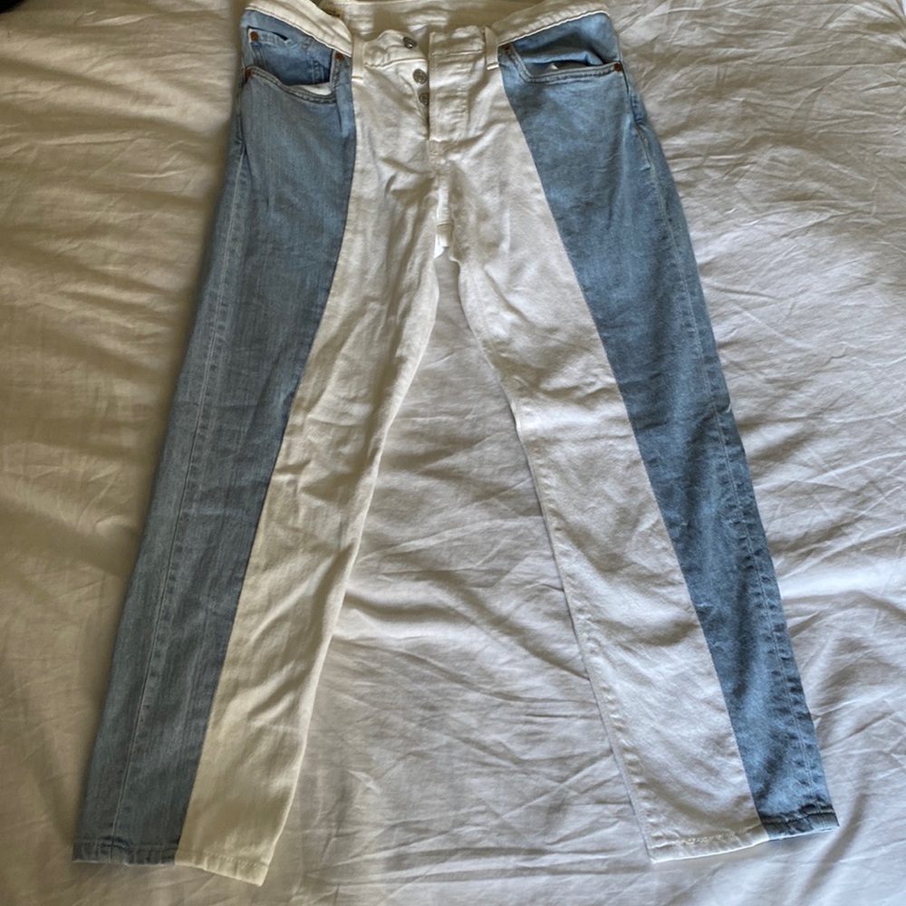 LEVI’s. premium vintage white and light wash stripes. button fly.